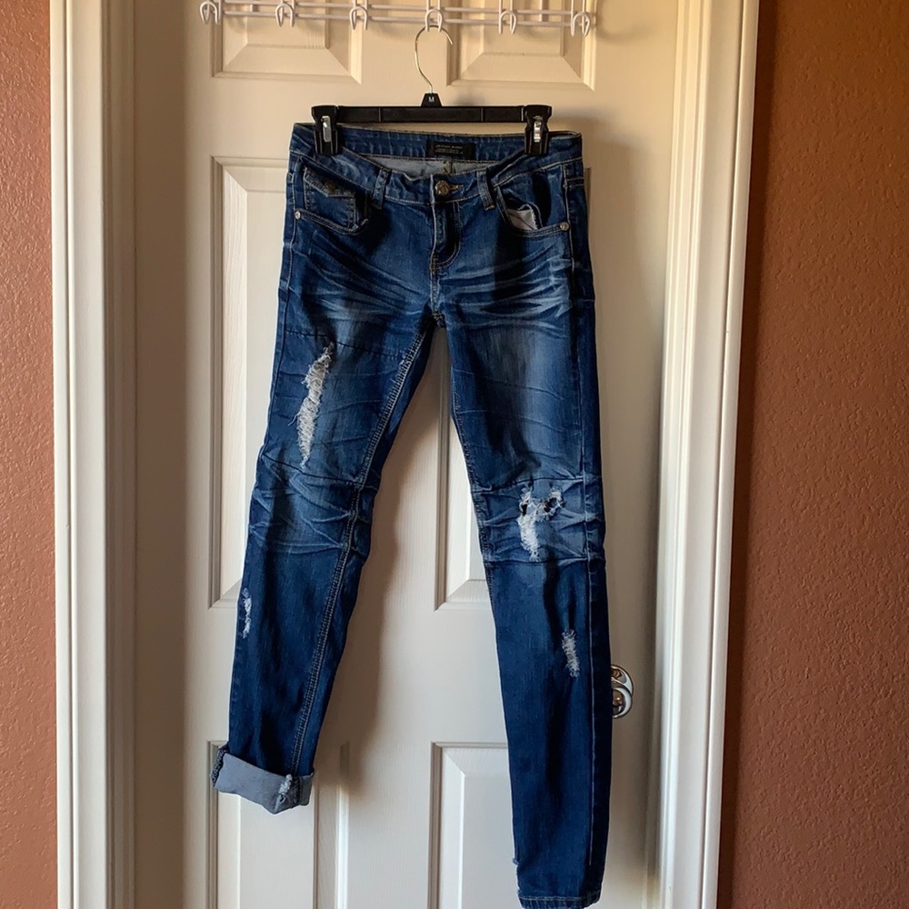 Distressed blue Jeans